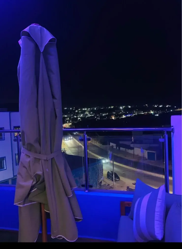 Terrace and neighbourhood lights at night